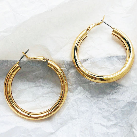 Medium Hoop Earrings in gold